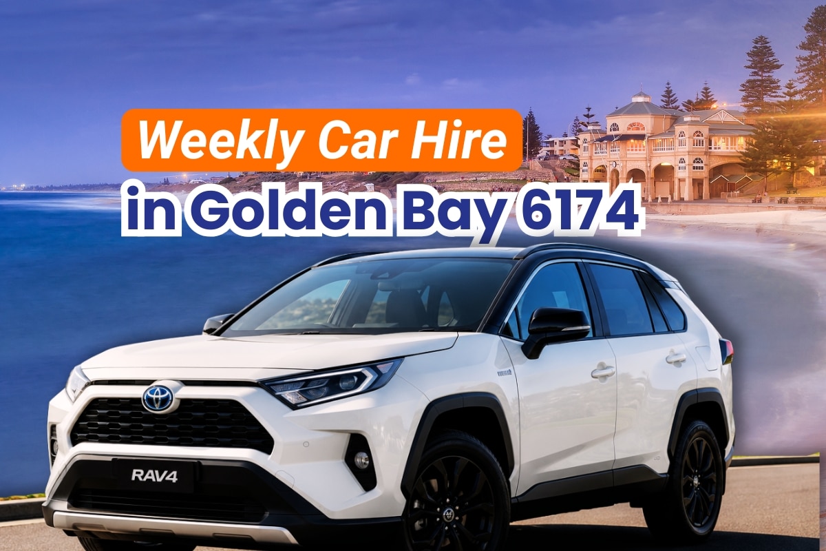 Weekly Car Hire in Golden Bay 6174 with a white Toyota RAV4 Hybrid by the beach.